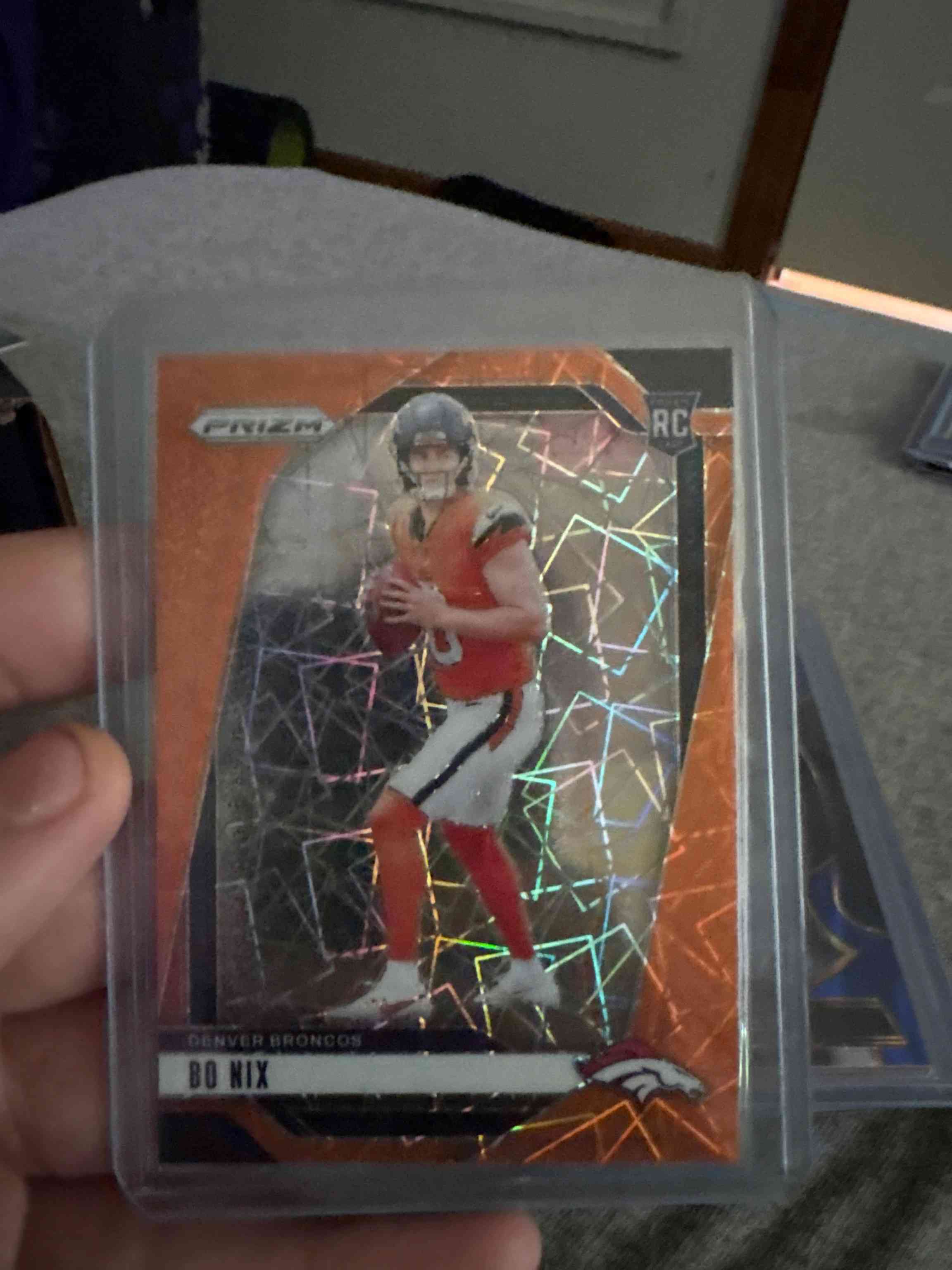 Image for 2024 panini prizm orange lazer bo nix #309