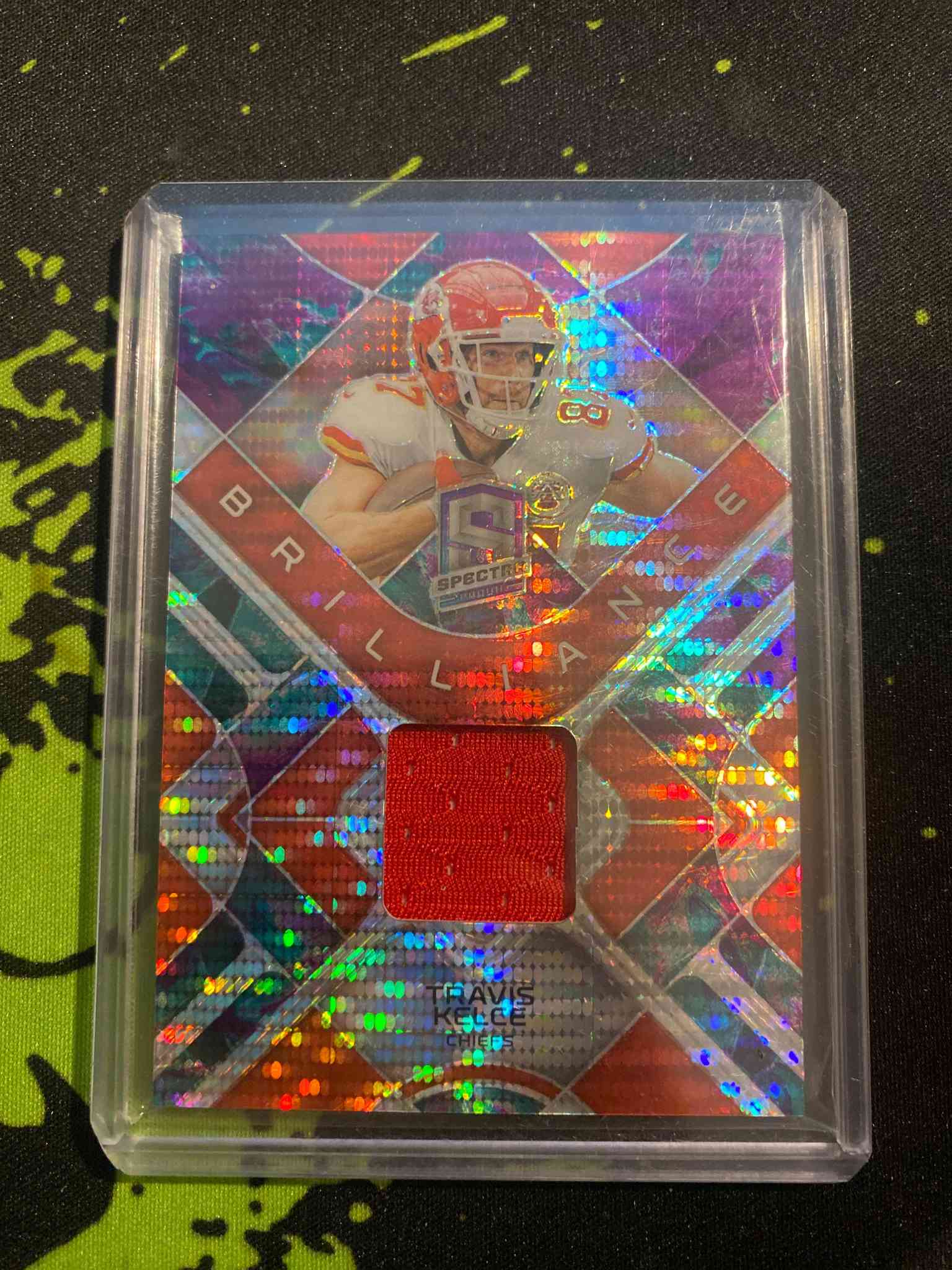 Image for travis kelce 2023 panini spectra brilliance patch /75 chiefs