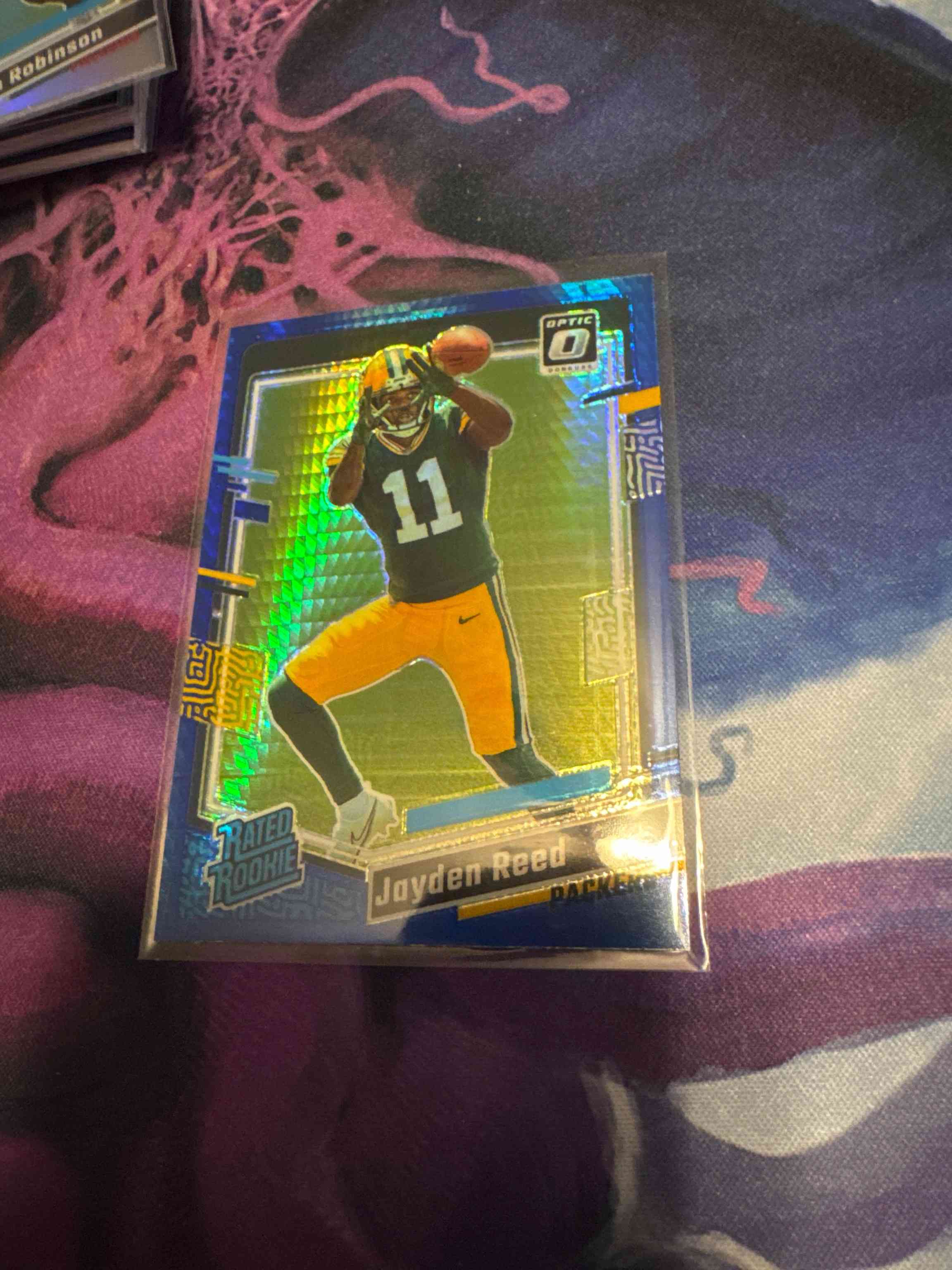 Image for 2023 panini donruss optic jayden reed rated rookie teal prizm /299 rc packers